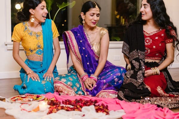 Indian family in traditional attire at ceremony